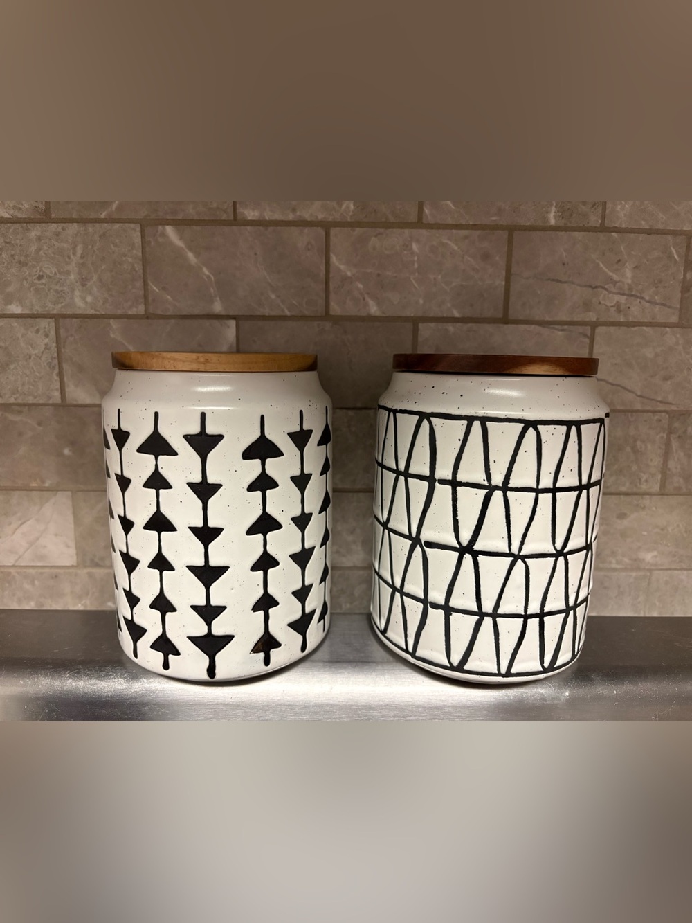 White Ceramic Storage Canister with Black Geometric Pattern and Wood Lid